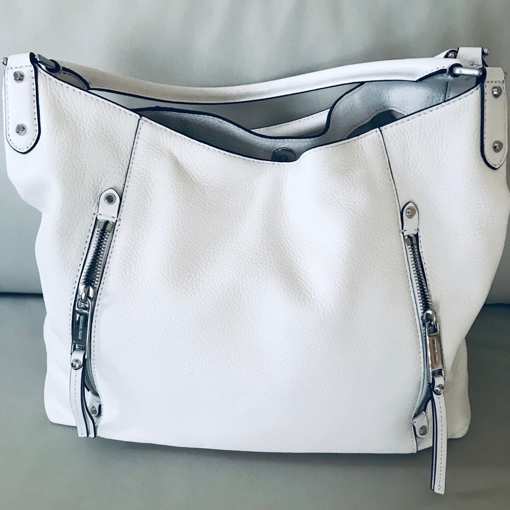 Michael Kors white bag.